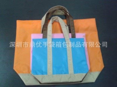 媽咪包 外貿出口日本大小號時尚手拎包媽咪袋 批發(fā)便當包手提袋-深圳市鼎優(yōu)手袋箱包制品提供媽咪包 外貿出口日本大小號時尚手拎包媽咪袋 批發(fā)便當包手提袋的相關介紹、產品、服務、圖片、價格深圳市鼎優(yōu)手袋箱包制品、拉桿箱包、手袋等等、皮具、紡織品、服裝服飾的購銷